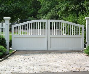 White wood driveway gate by Tri State Gate, New York