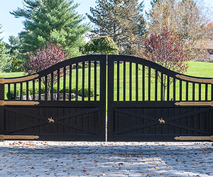 Wooden swing driveway gate by Tri State Gate, New York
