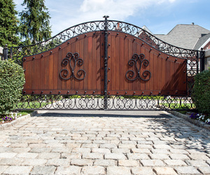 Custom mahogany and wood automatic driveway gate