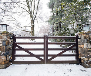 Simple wooden automatic driveway gates