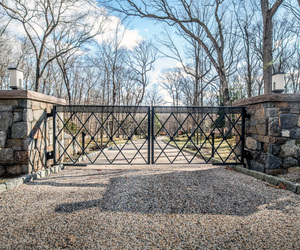Custom wrought-iron modern driveway gates