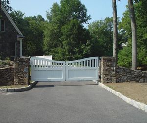 White wood gate driveway gate design by Tri State Gate, New York