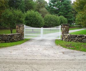 White picket driveway gate design by Tri State Gate, New York