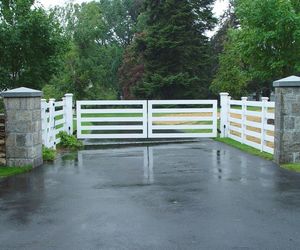 Modern wooden automated driveway gate by Tri State Gate, New York