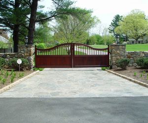 Mahogany automatic wooden gate design by Tri State Gate, New York